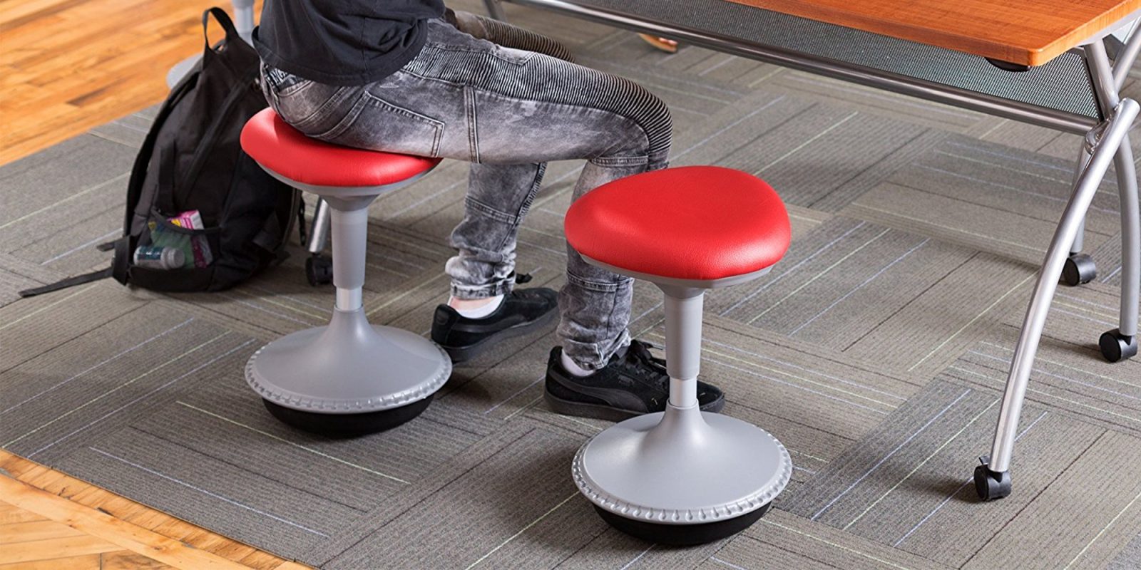 This leaning height-adjustable stool completes your standing desk setup
