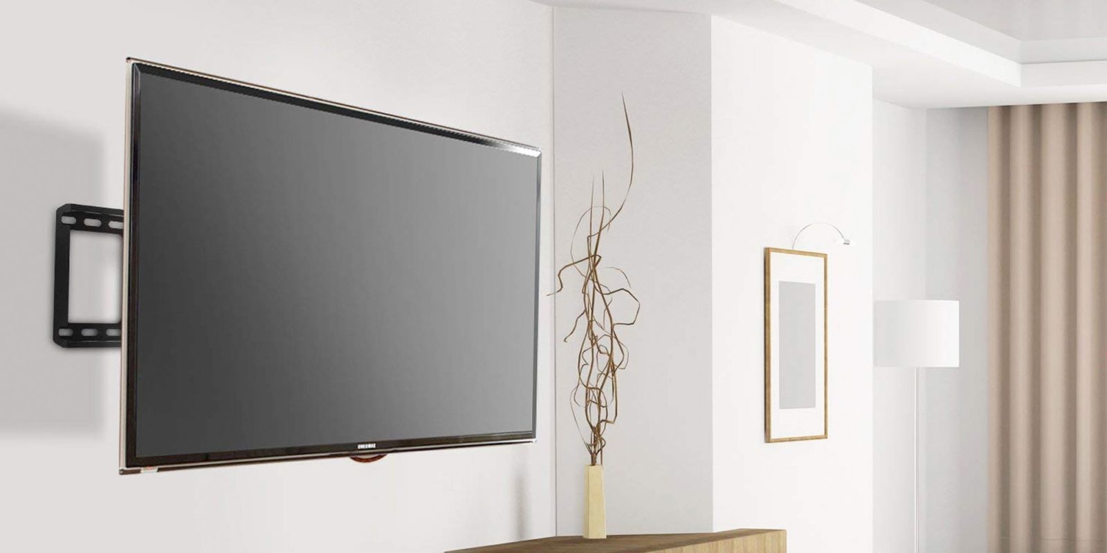 Finally hang your TV w/ this full motion wall mount for