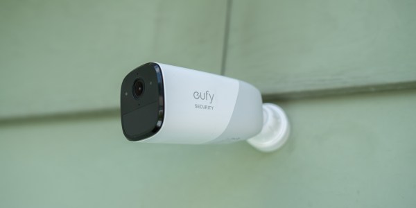 eufyCam 2 mounted on the side of a house.