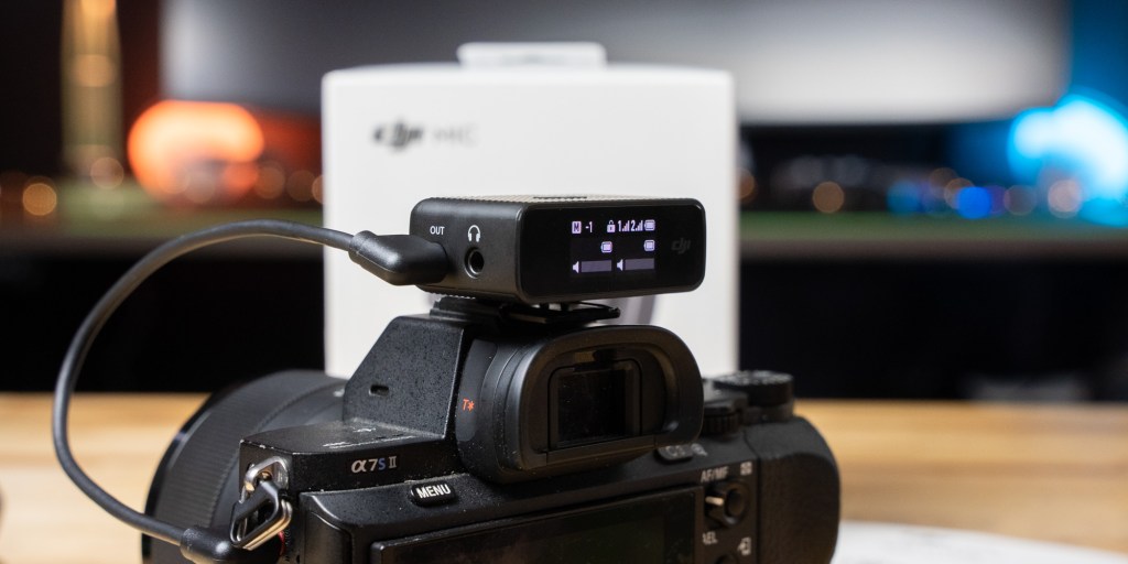 DJI Mic mounted on top of a Sony camera.