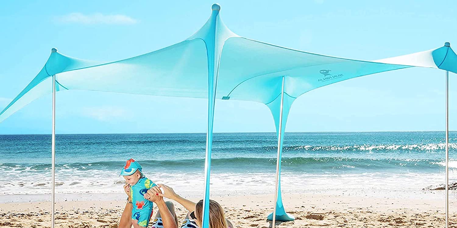 Gold Box has Sun Ninja's 10-ft. Pop Up Beach Tent Canopy bundle at  $104 (Reg. $160)