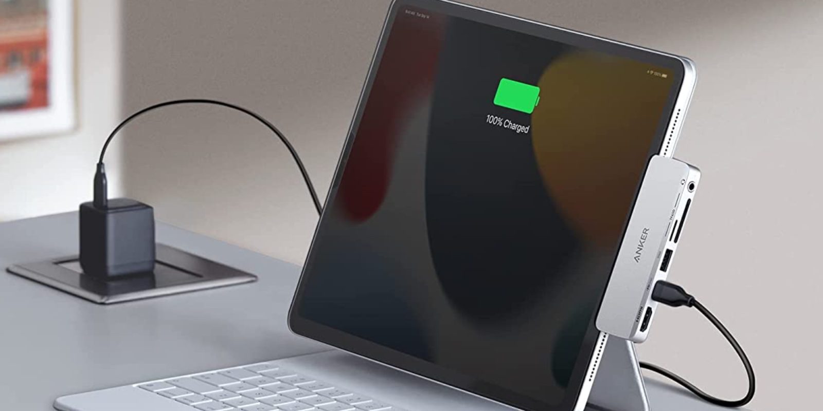 a laptop computer sitting on top of a table