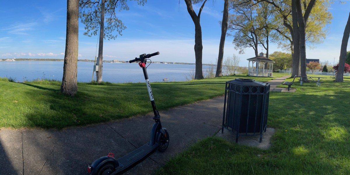 a bench next to a body of water