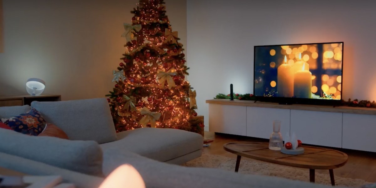 a living room with a christmas tree