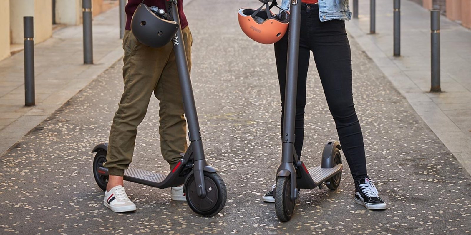 a woman standing on a sidewalk
