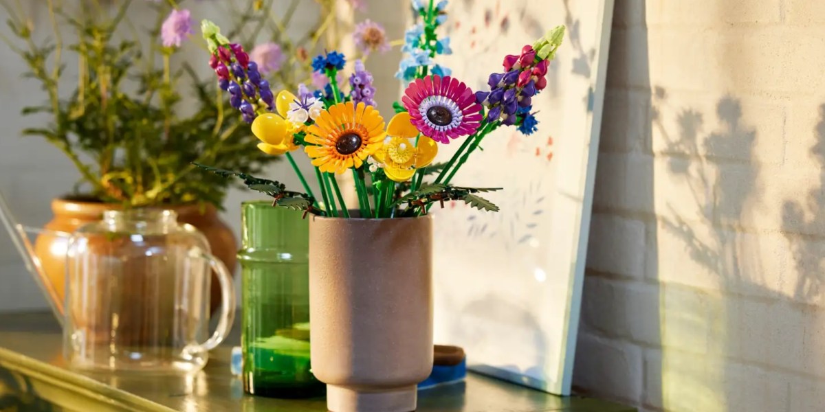 a bouquet of flowers in a vase on a table