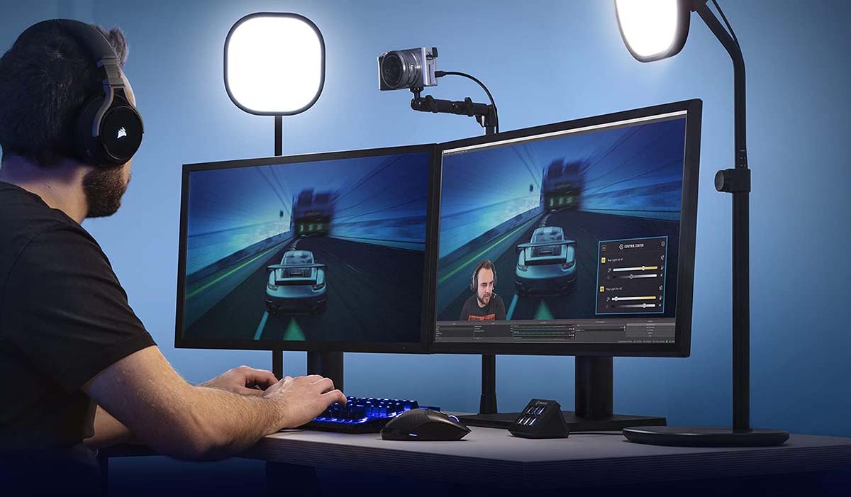 a man standing in front of a computer