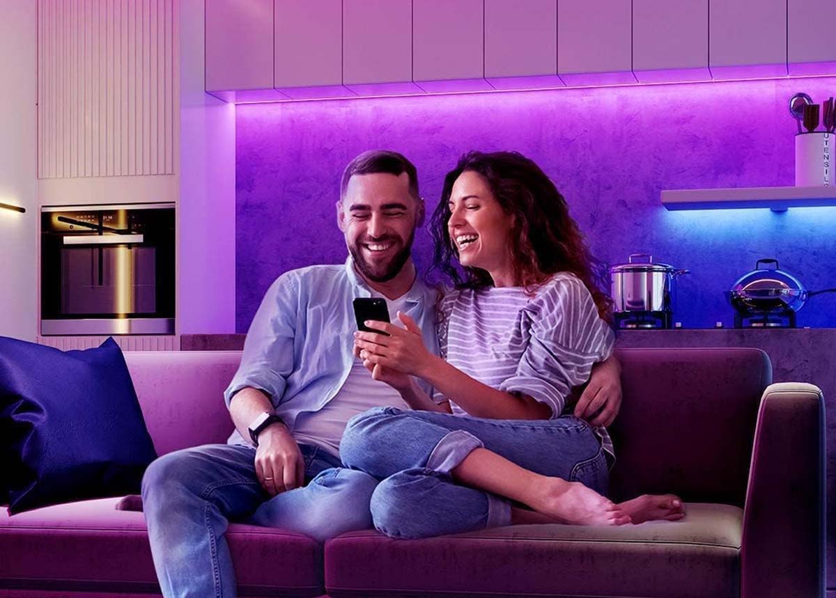 a man and a woman sitting on a couch