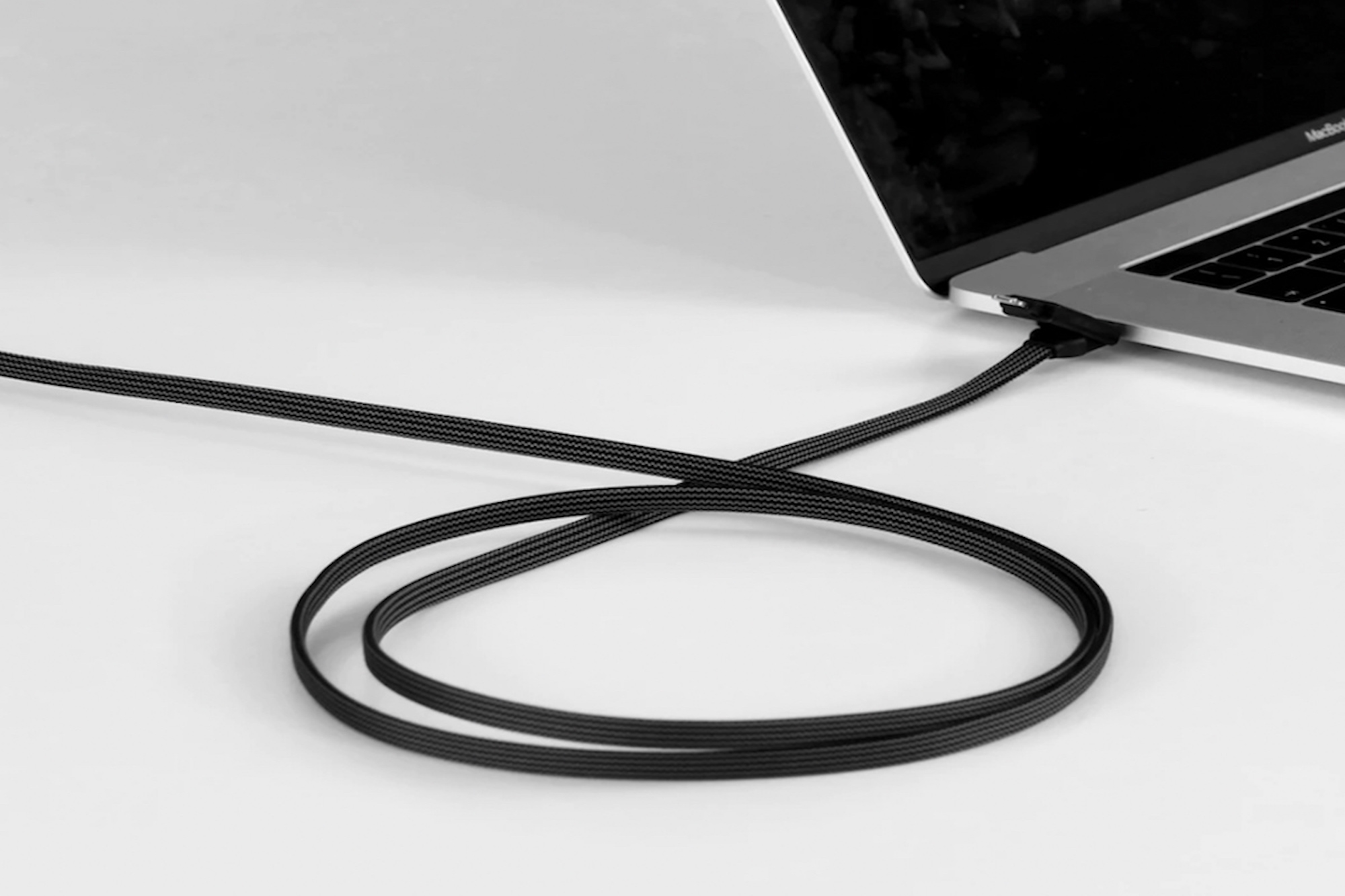 an open laptop computer sitting on top of a table