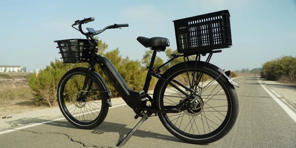 a bicycle parked on the side of a road
