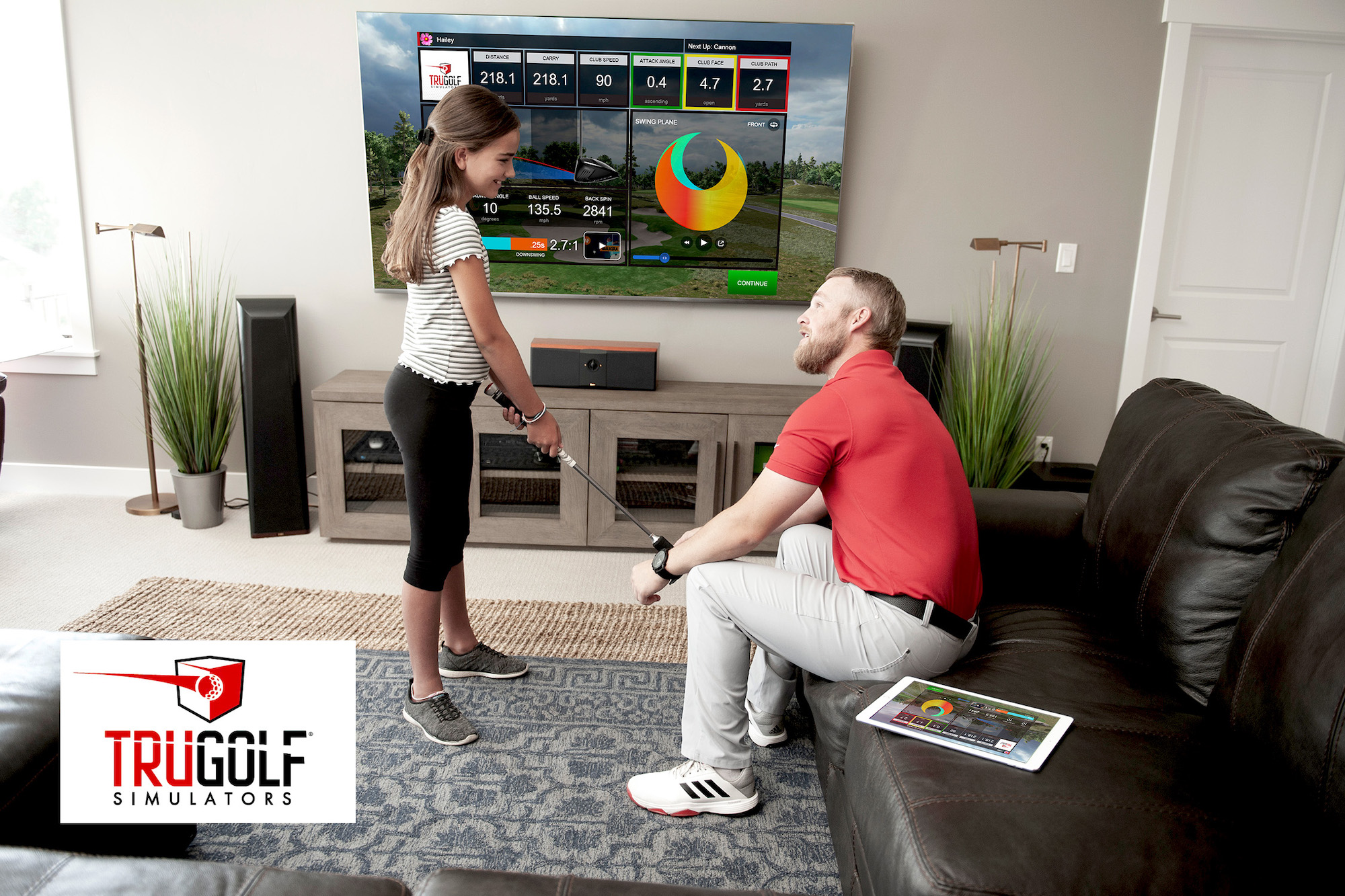 a person standing in front of a television