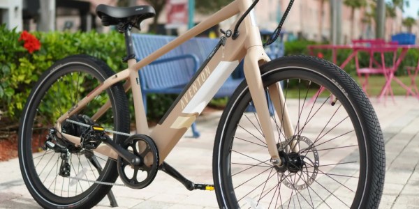 a bicycle parked on the side of a building