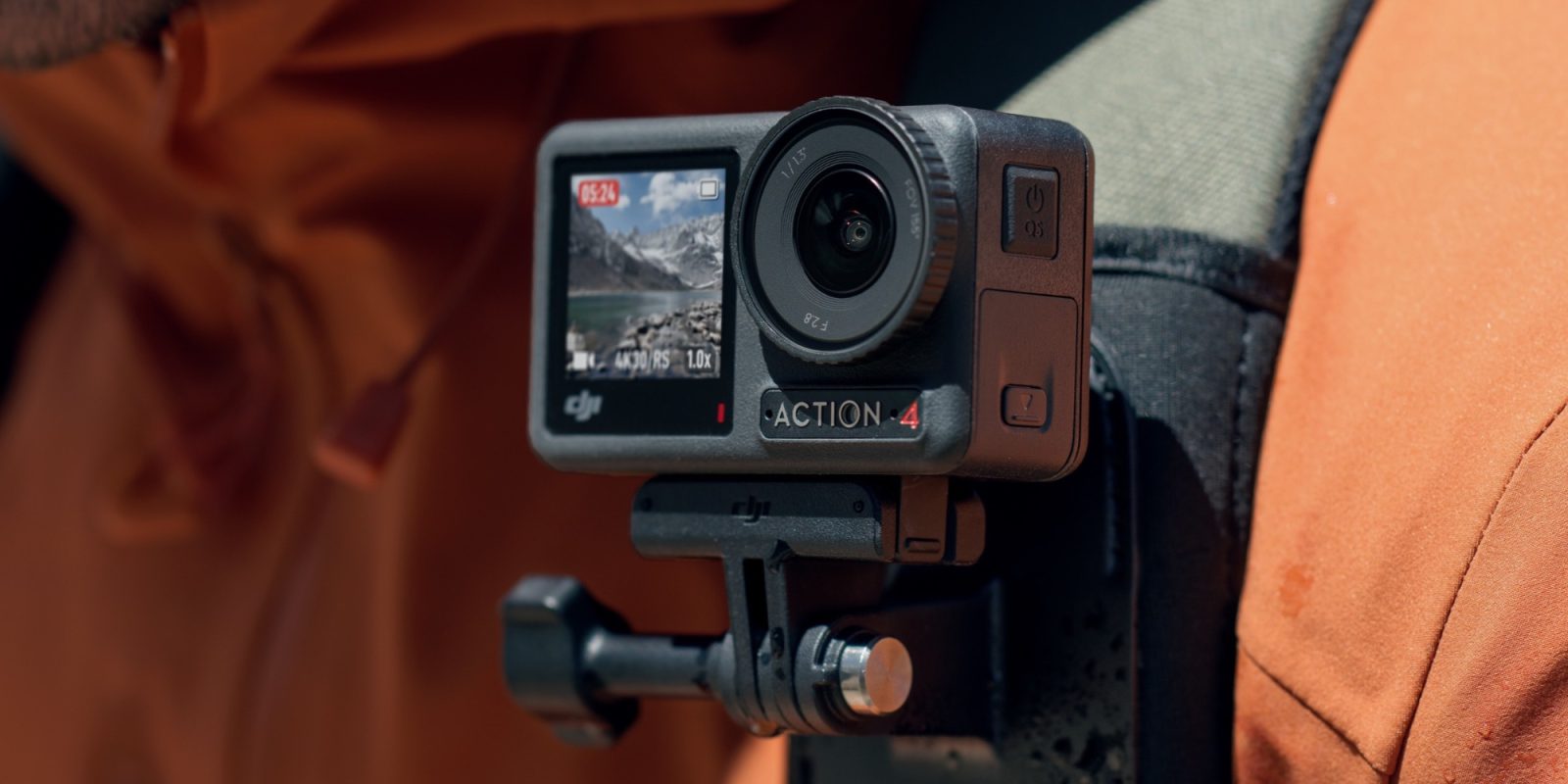 a close up of a person holding a camera