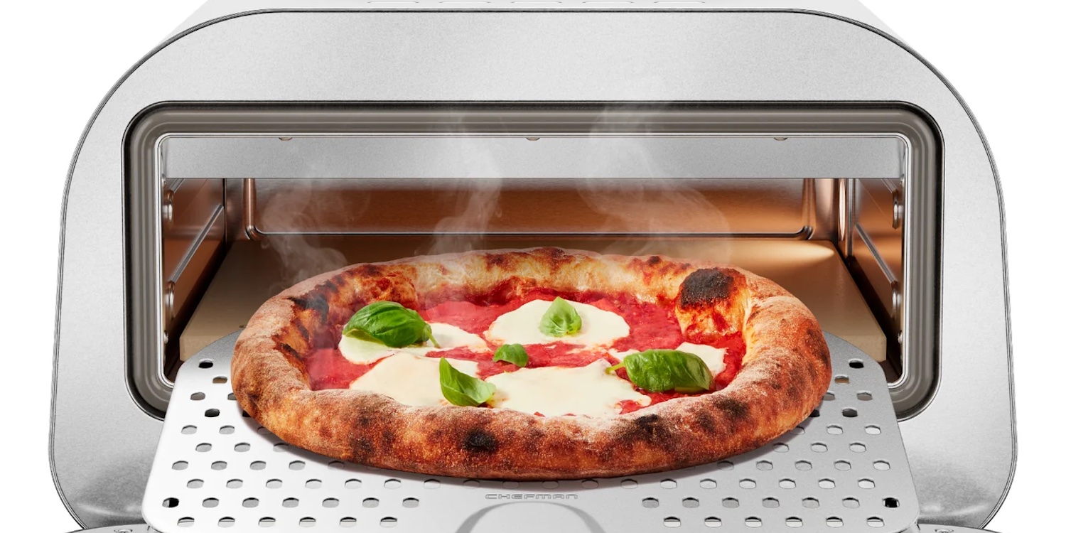 a tray of food on a stove top oven sitting inside of a car