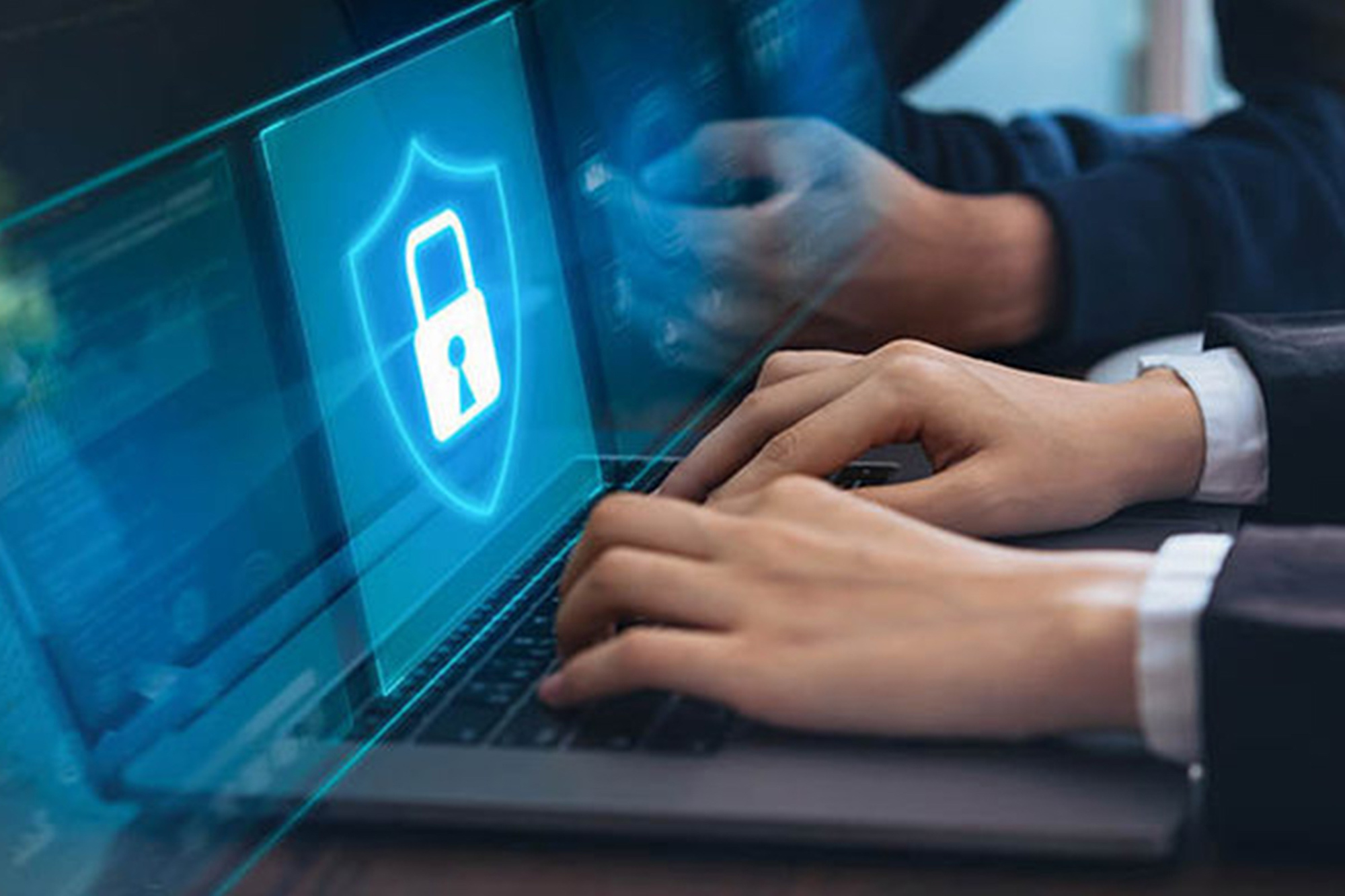 a person using a laptop computer