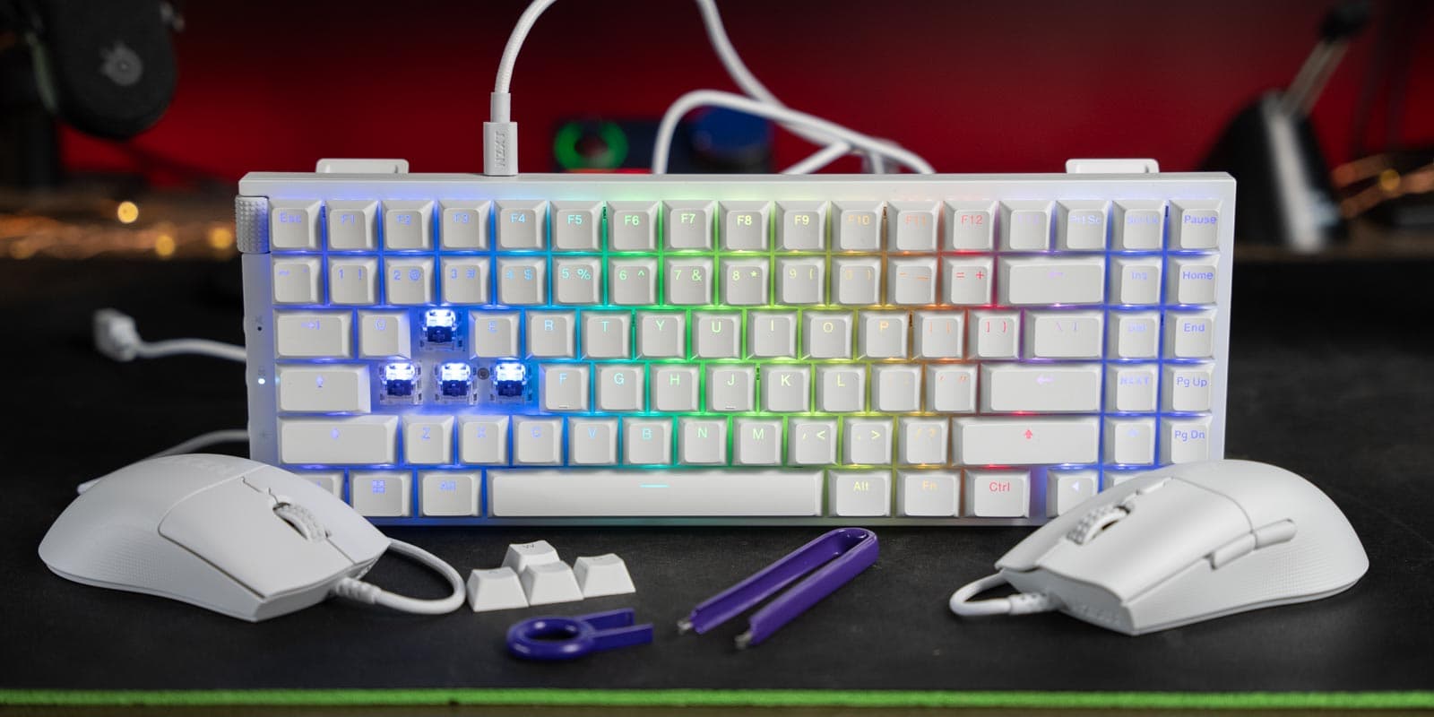 a desk with a computer mouse and keyboard