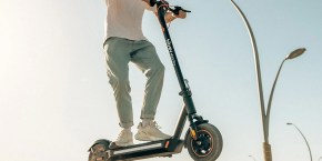 a man riding a scooter