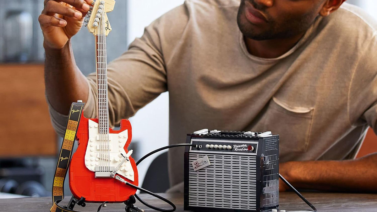 a man playing a guitar