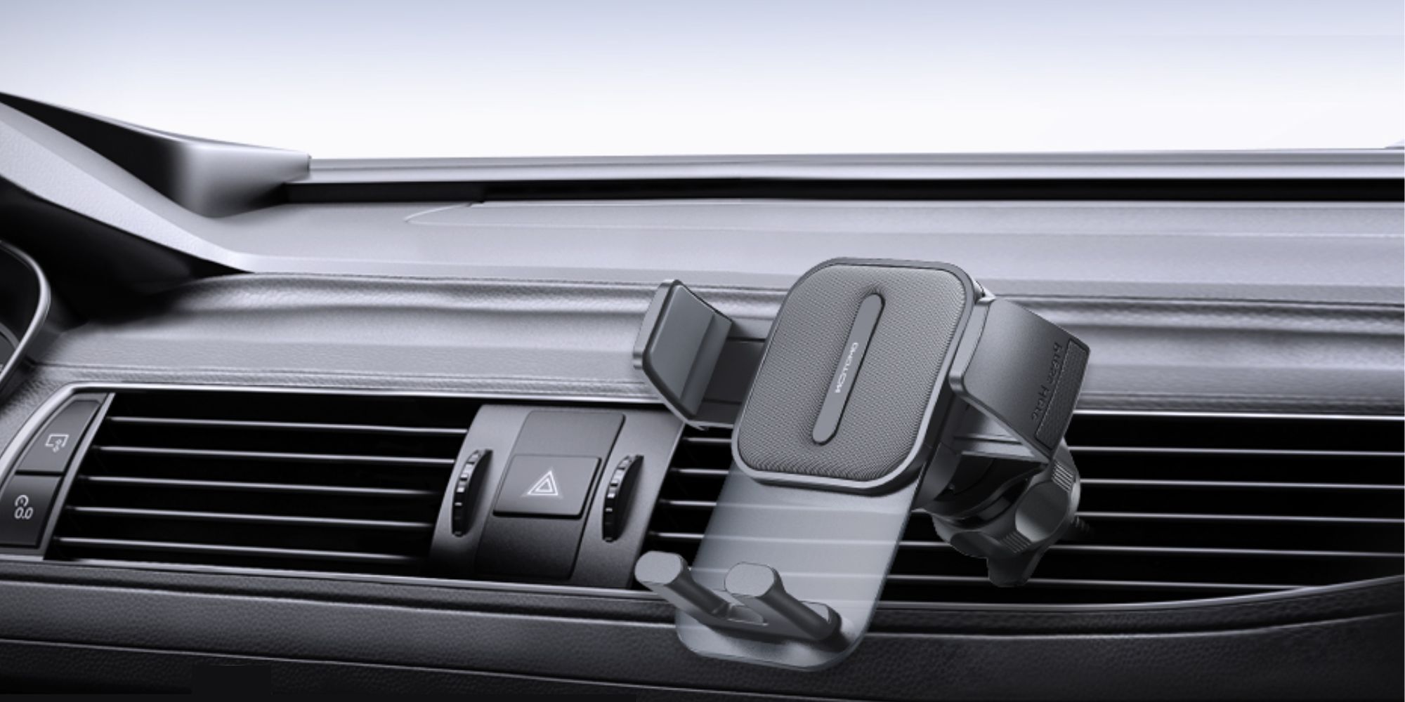 Image showing OMOTON's car vent mount installed on a car.