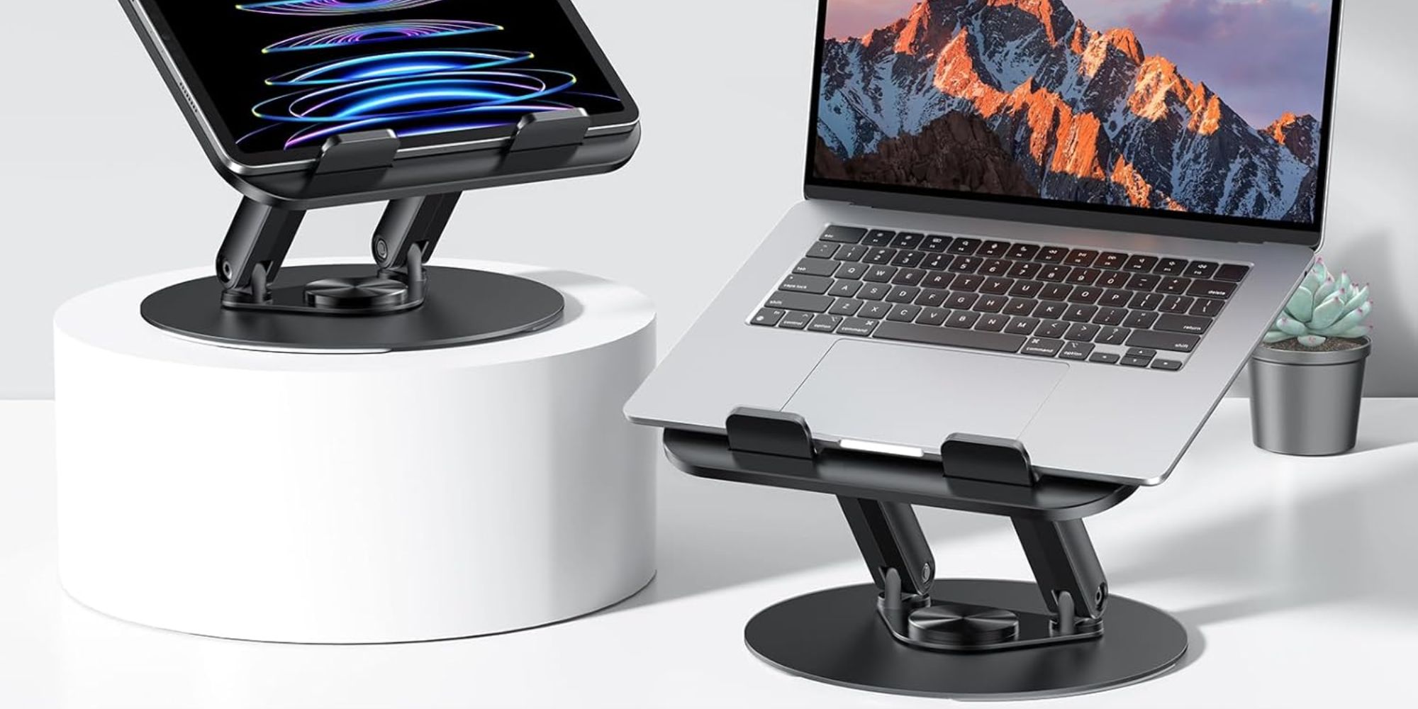 Image showing a laptop and an iPad on a stand.