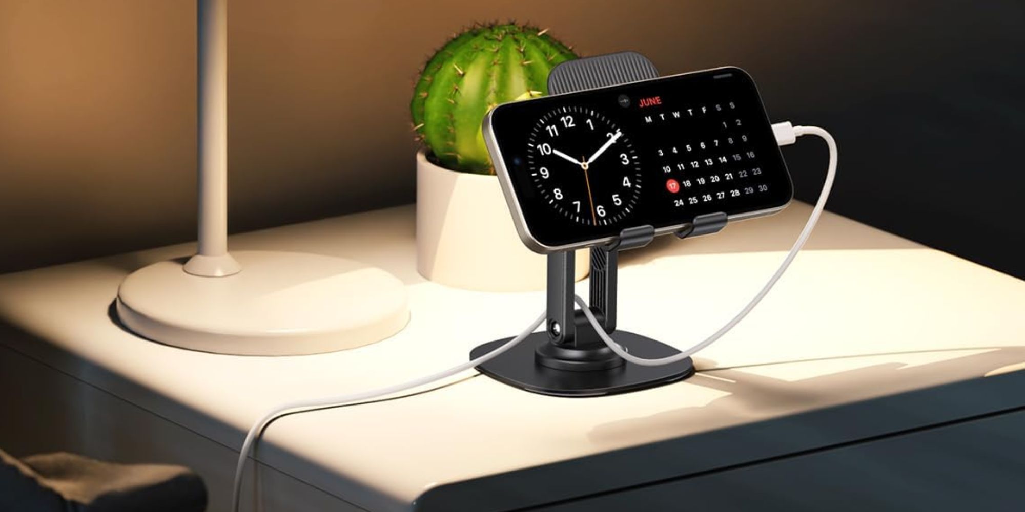 Image showing an iPhone mounted on a phone holder.