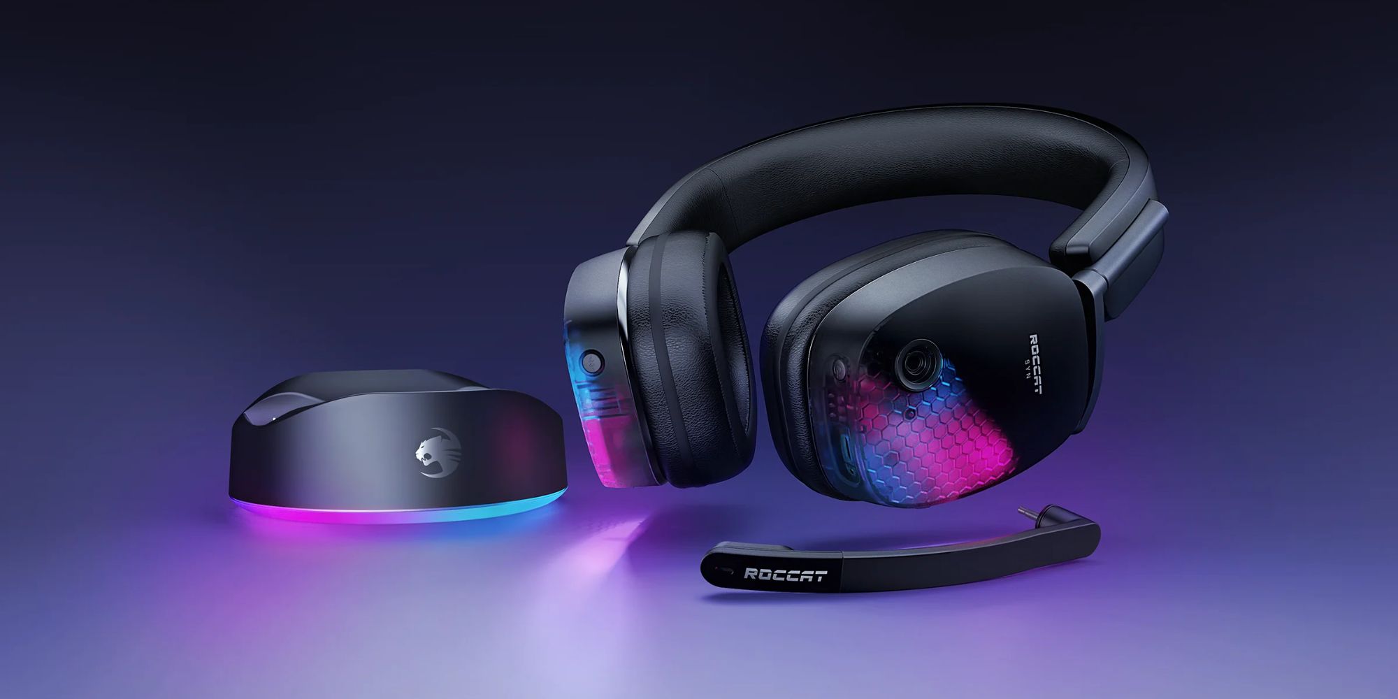 Image showing ROCCAT SYN Max Air gaming headset with RGB kept on a desk next to its charging dock.