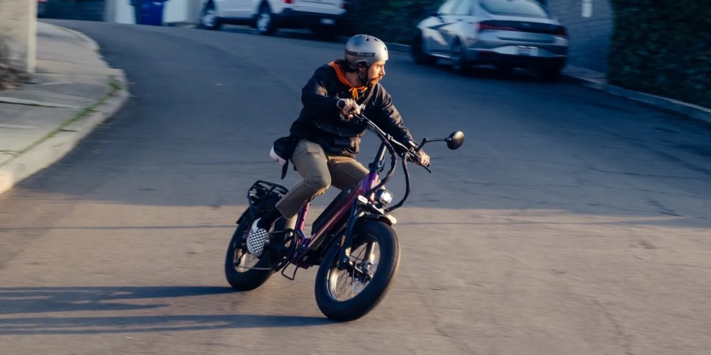 a man riding a motorcycle