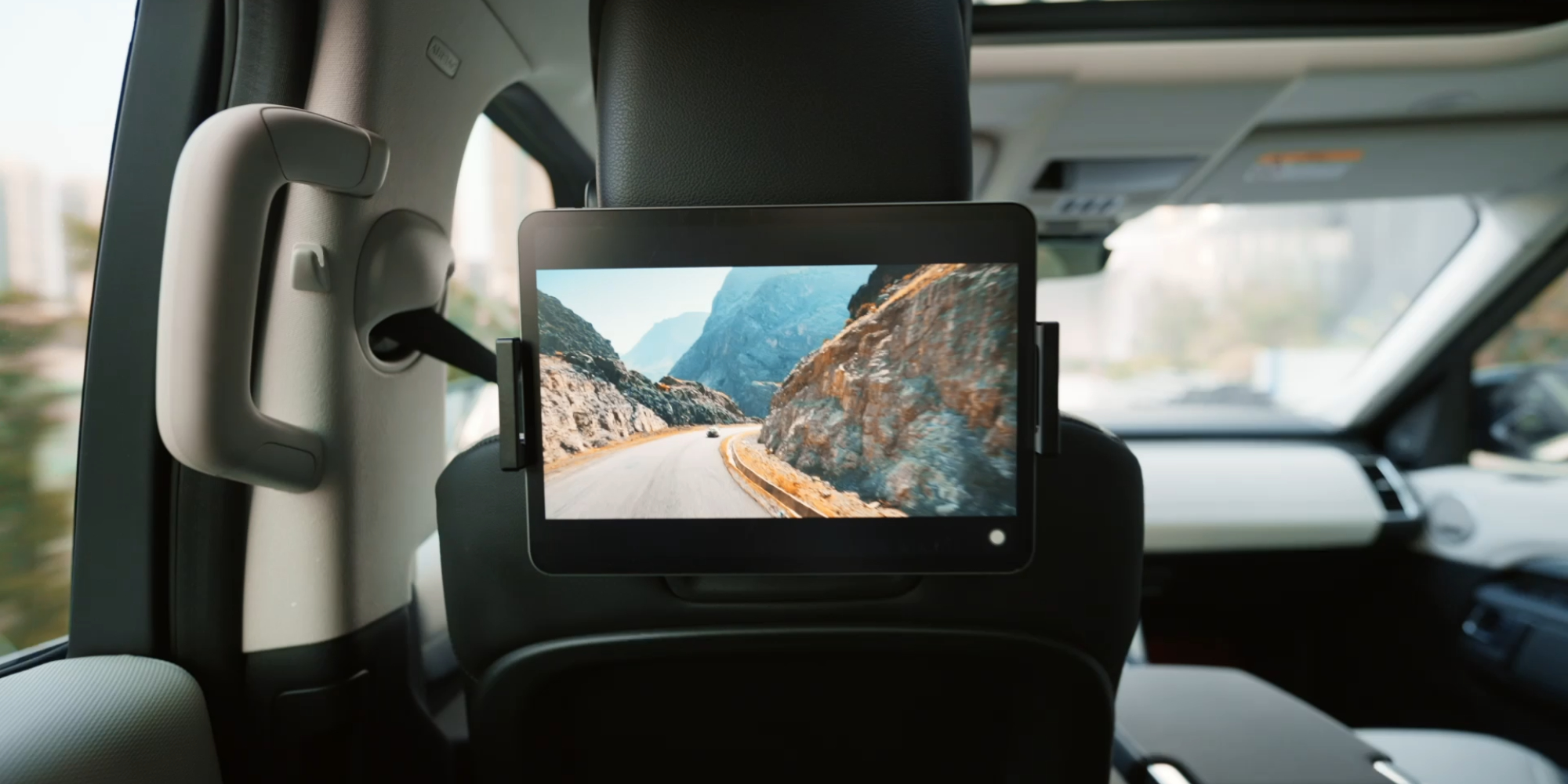 Keep backseat riders entertained with this 11inch iPad car mount for