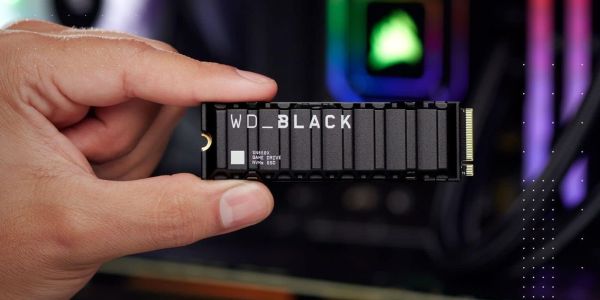 Image showing a person holding WD_BLACK SN850X SSD.