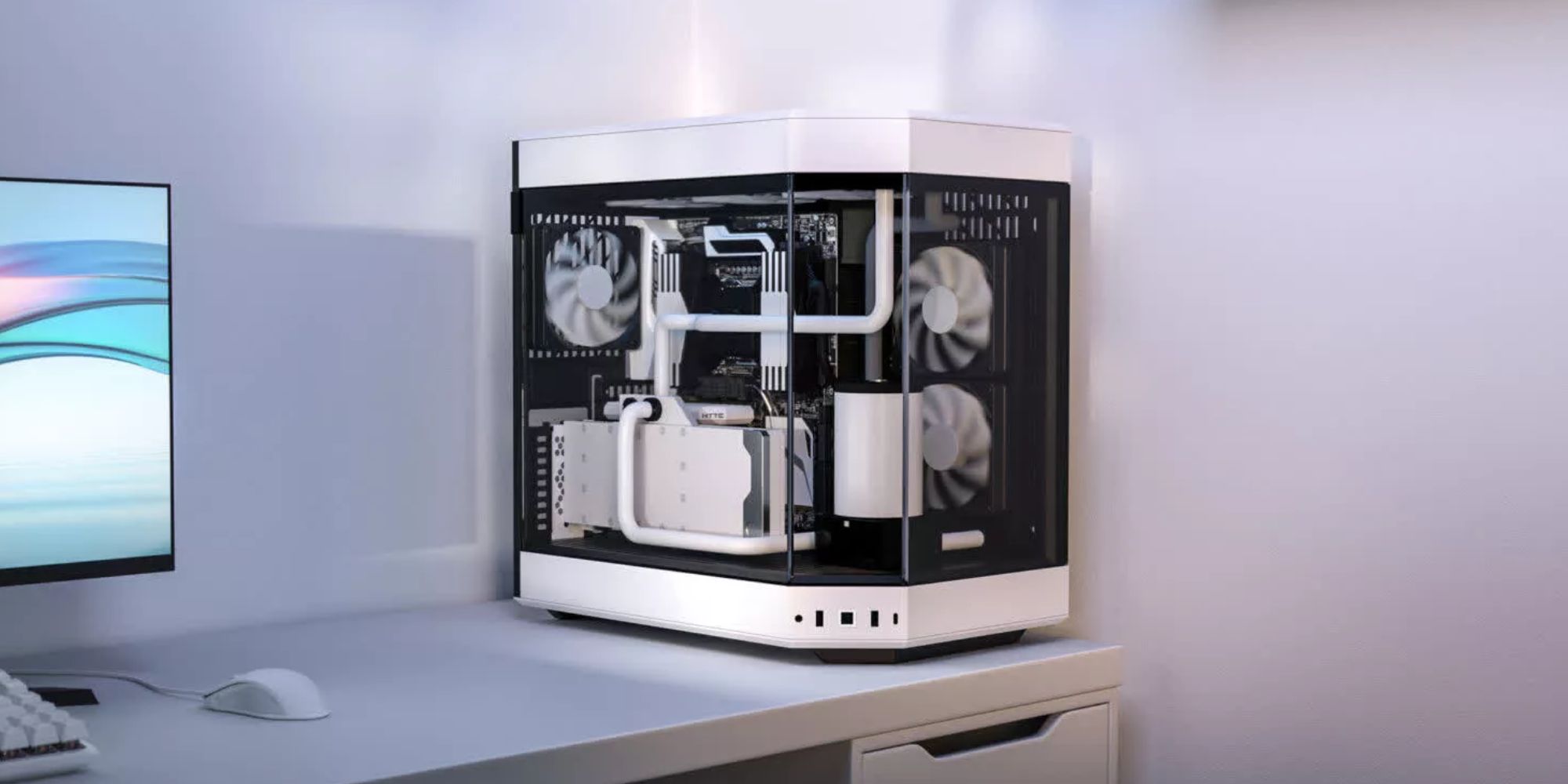Image showing a render of HYTE Y60 PC case in white on a desk.