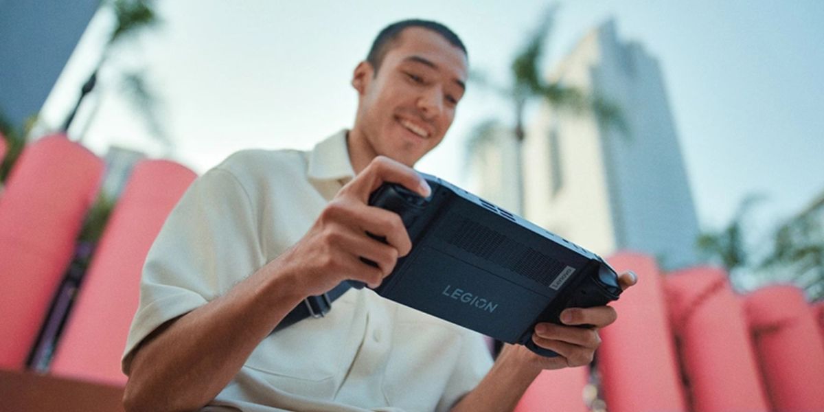 Image showing a person holding Lenovo's Legion gaming handheld.