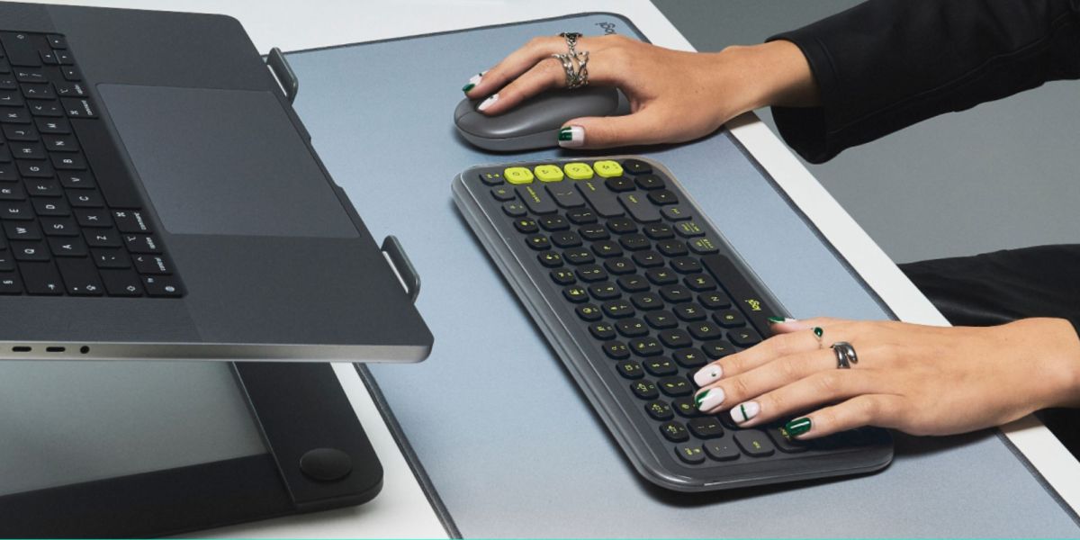 Image showing a person using Logitech's POP ICON Keys wireless keyboard and mouse.