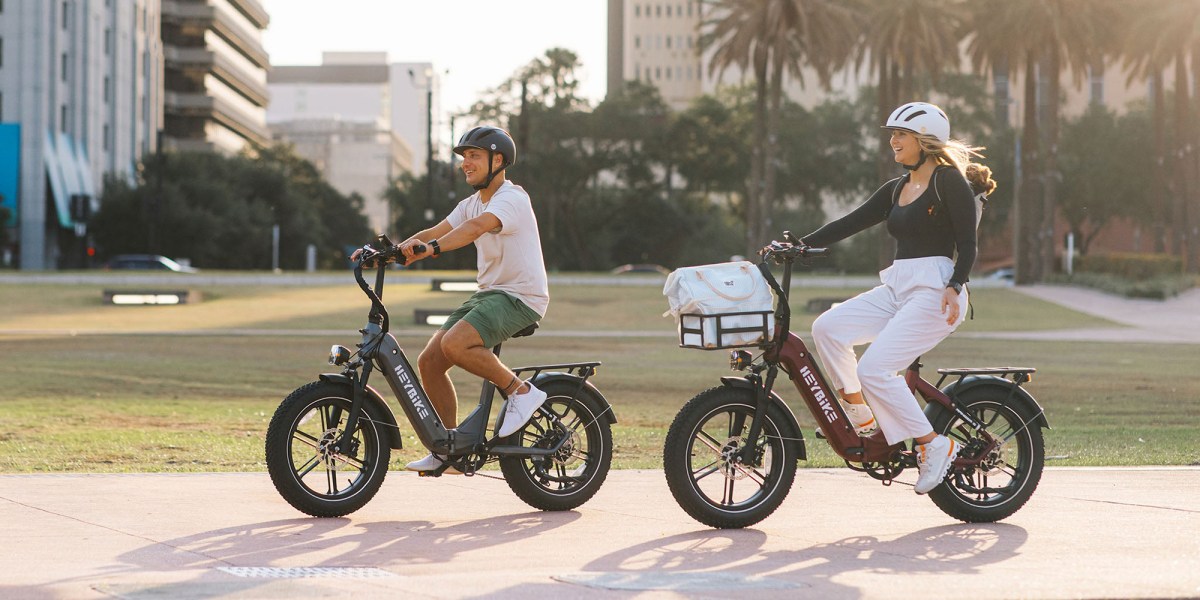 a man and a woman riding bikes