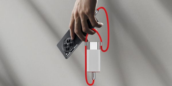 Image showing a person holding OnePlus' new Pouch charging unit.