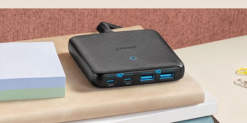 Image showing Anker's 543 GaN charging dock kept on a notebook.