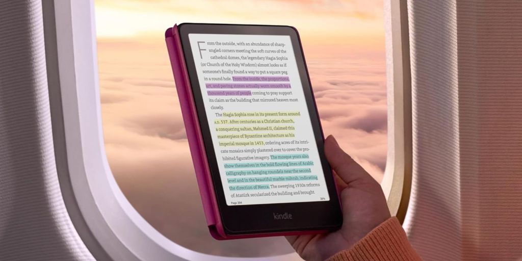 Image showing a person using Kindle Colorsoft in an airplane.