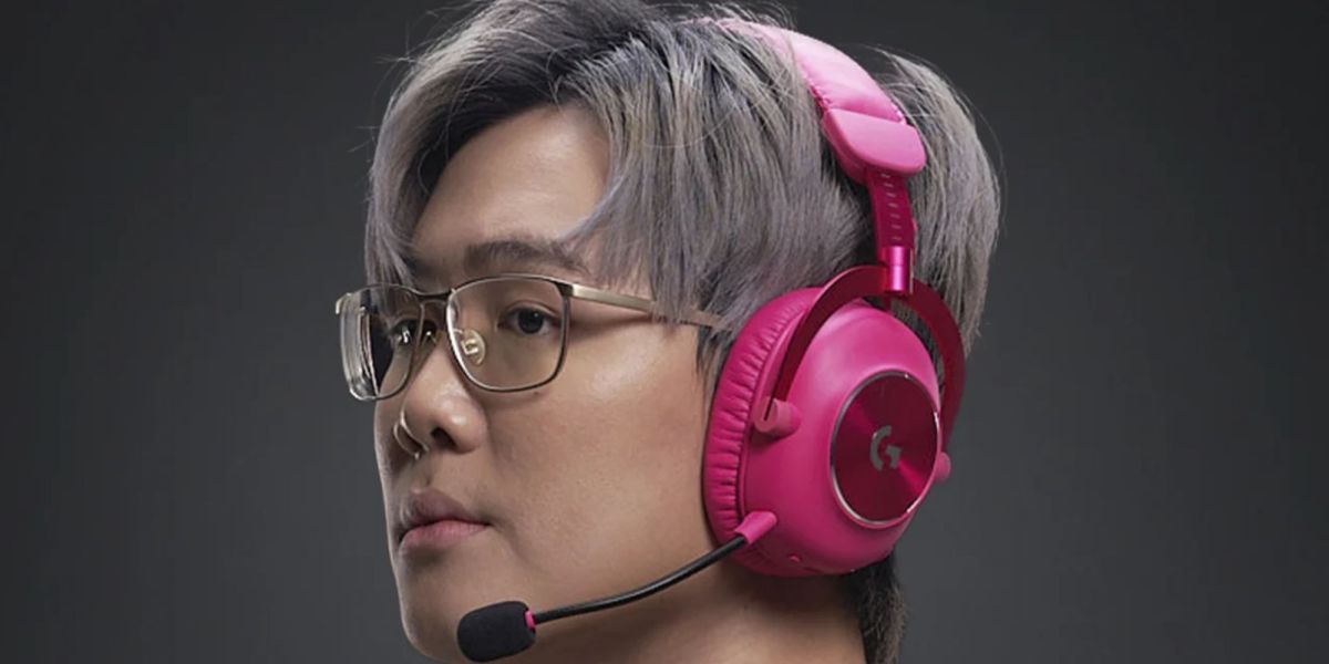 Image showing a person wearing Logitech's G PRO X 2 LIGHTSPEED headset in magenta colorway.