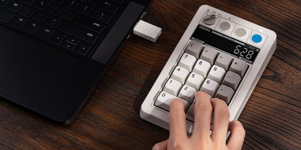 Image showing a person using 8BitDo's 108 Numpad.