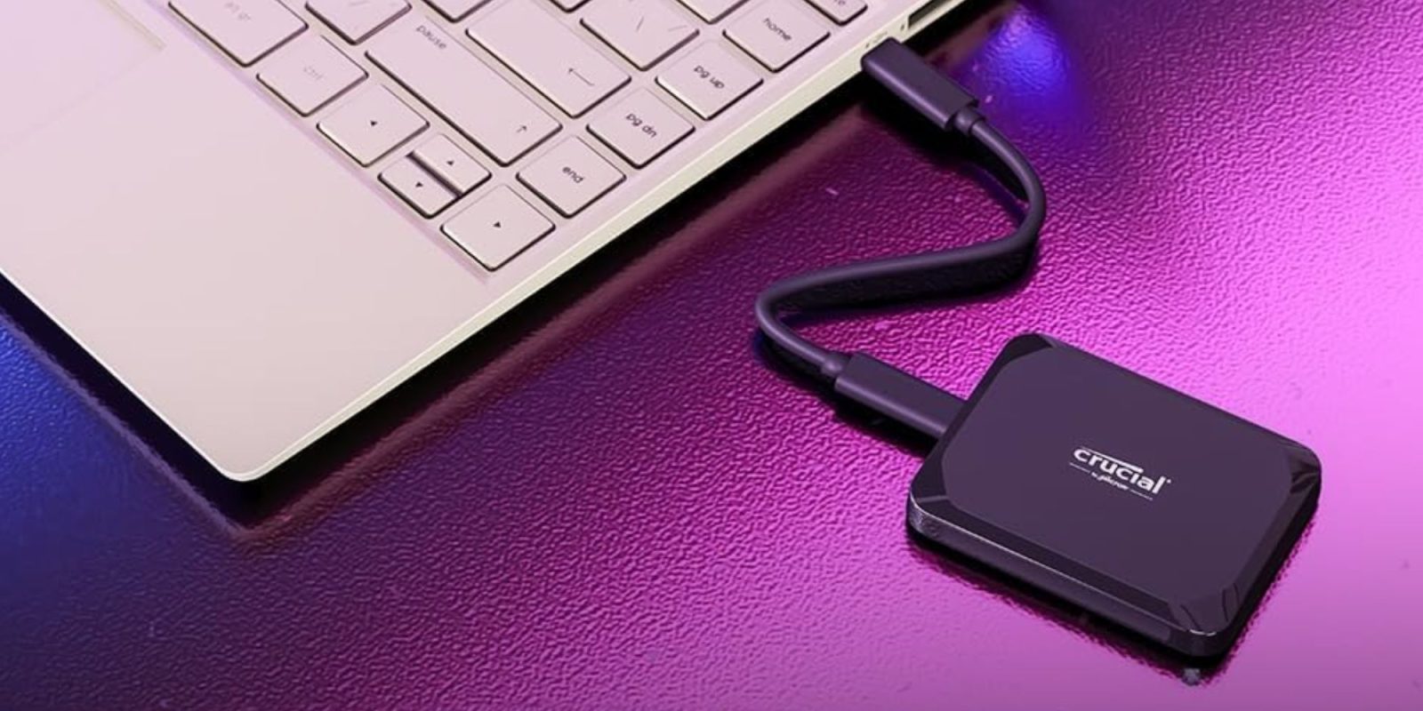 Image showing Crucial's X9 portable SSD in black.