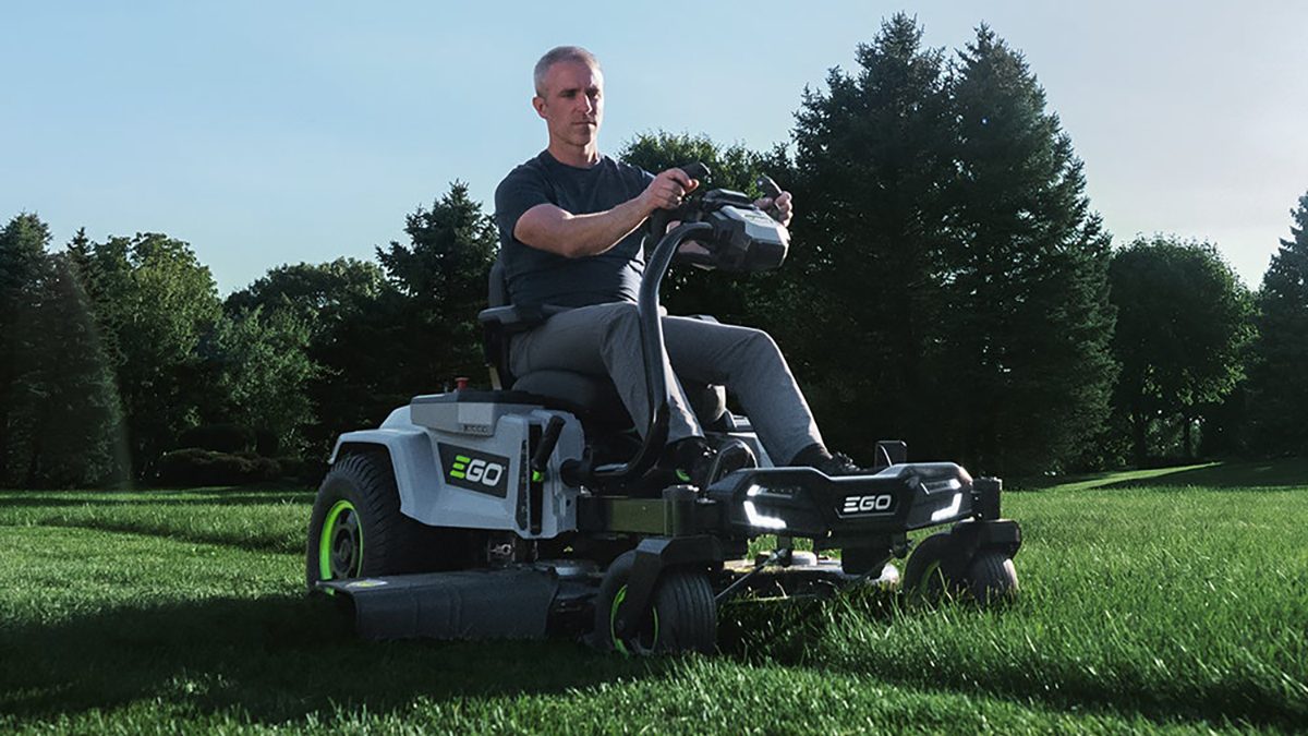 A man riding a lawn mower
