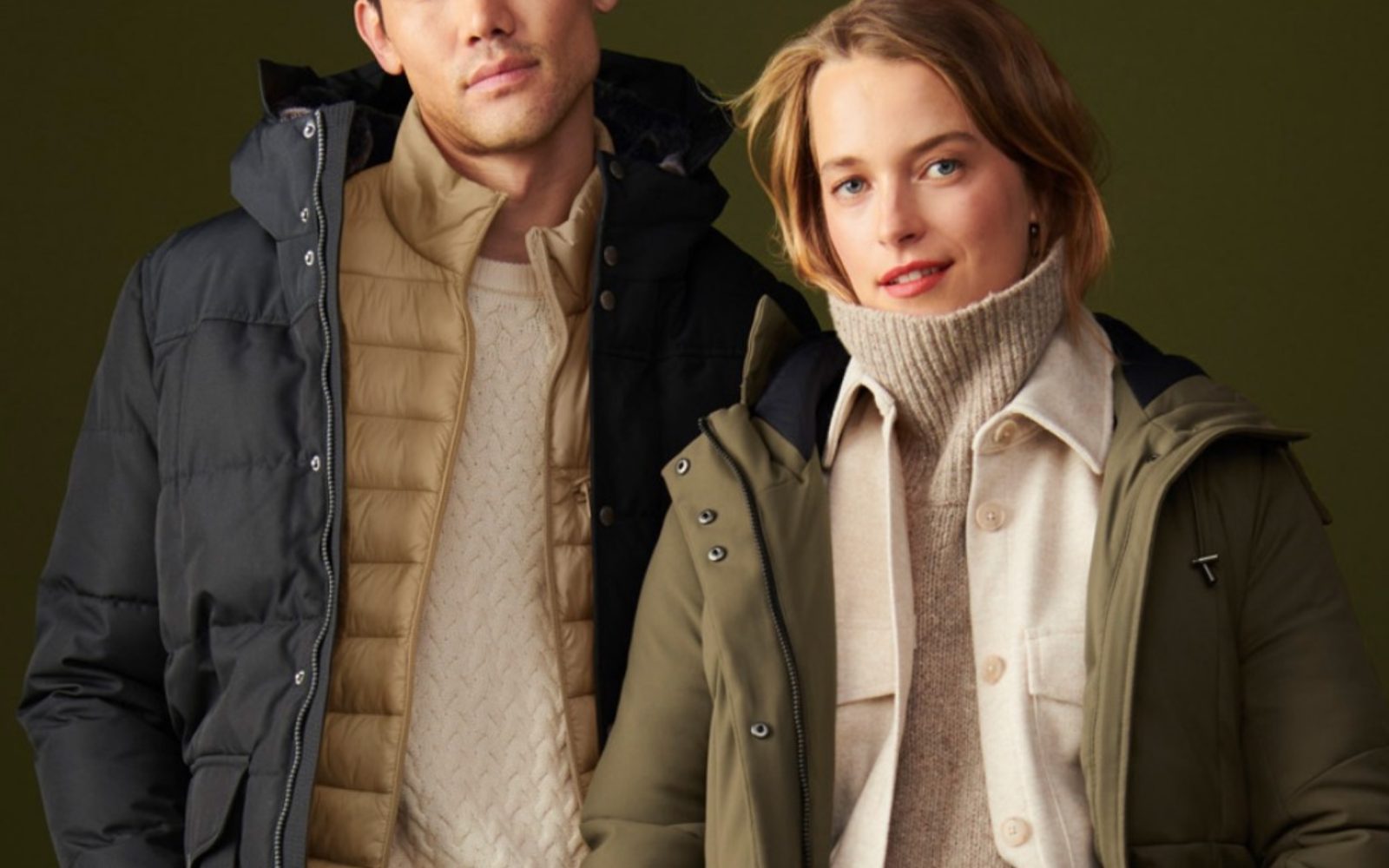 A man and woman posing for a picture