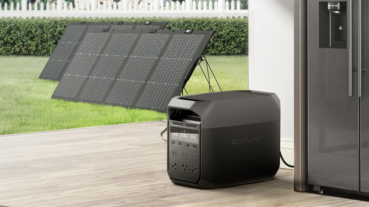 A solar panel next to a power outlet