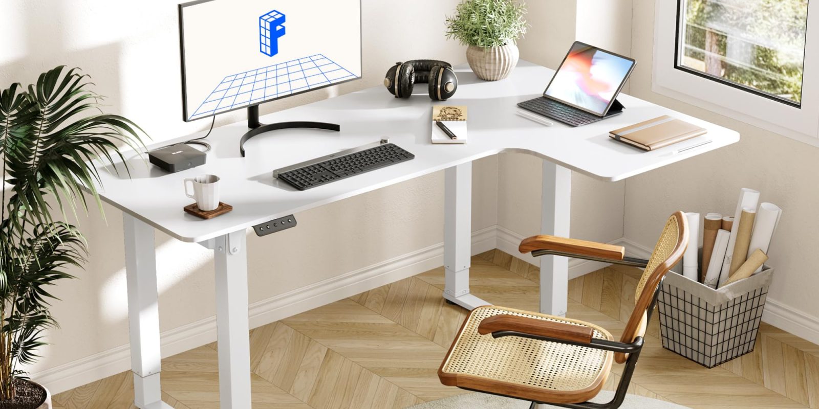 A desk with a computer and a monitor