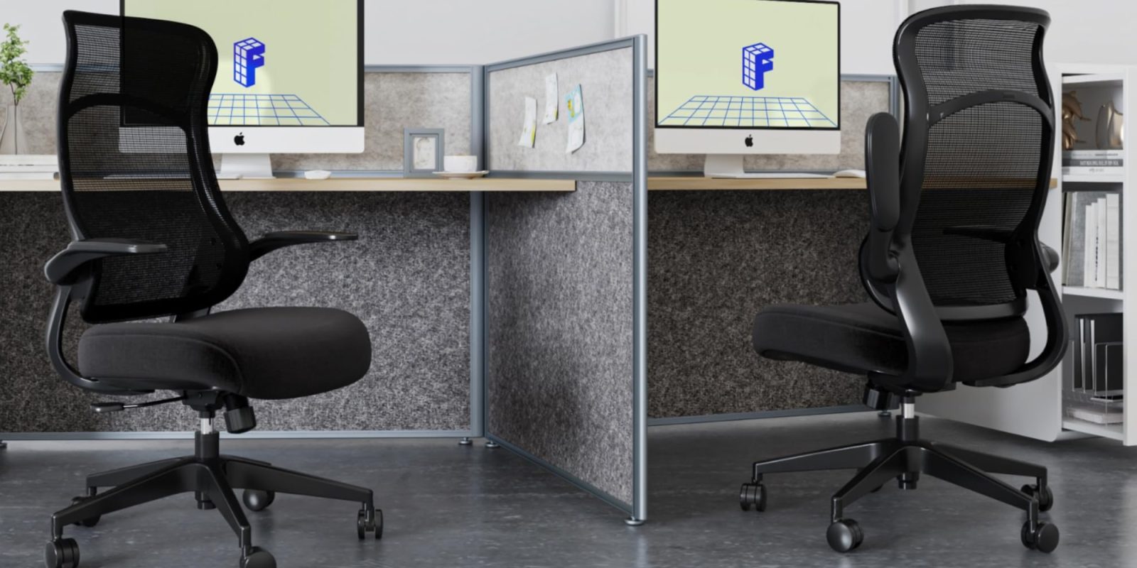 A cubicle with chairs and desks