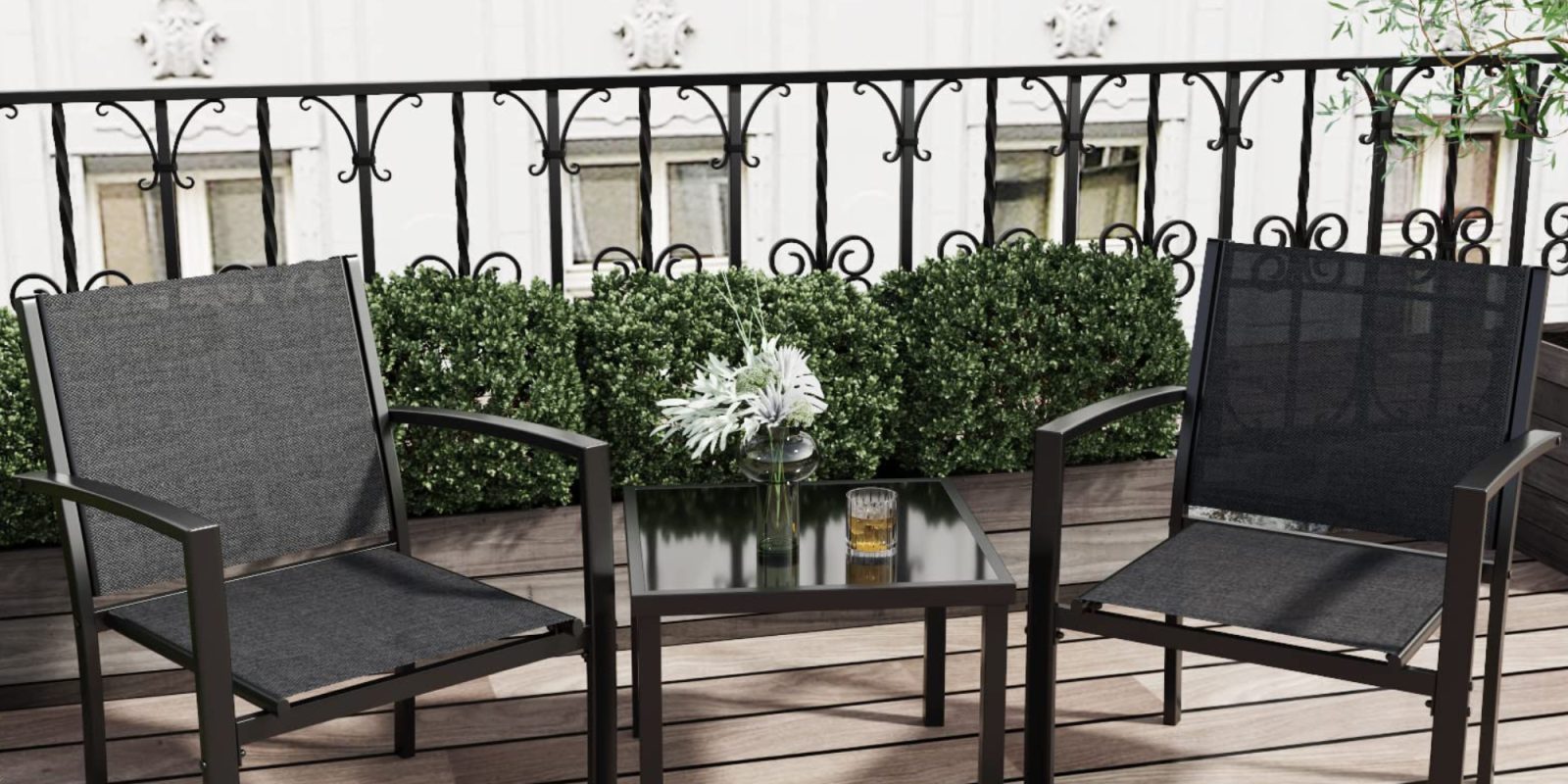 A table and chairs on a deck