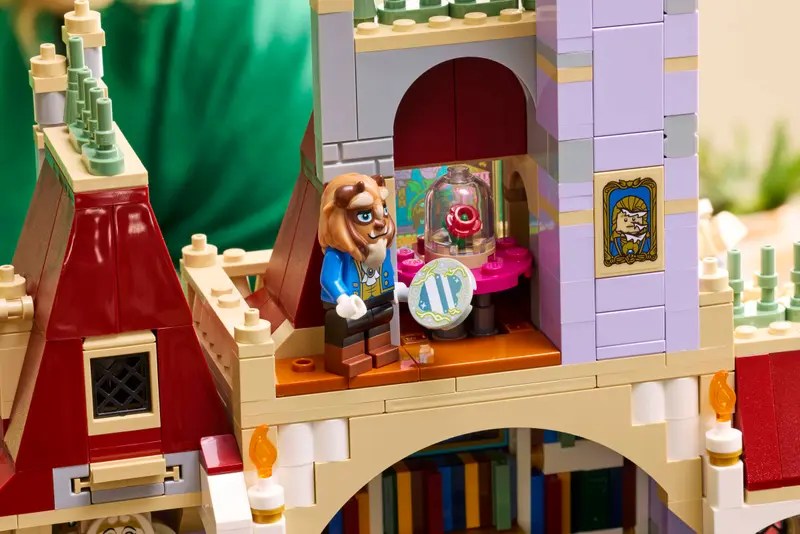 A toy building with a lion figure