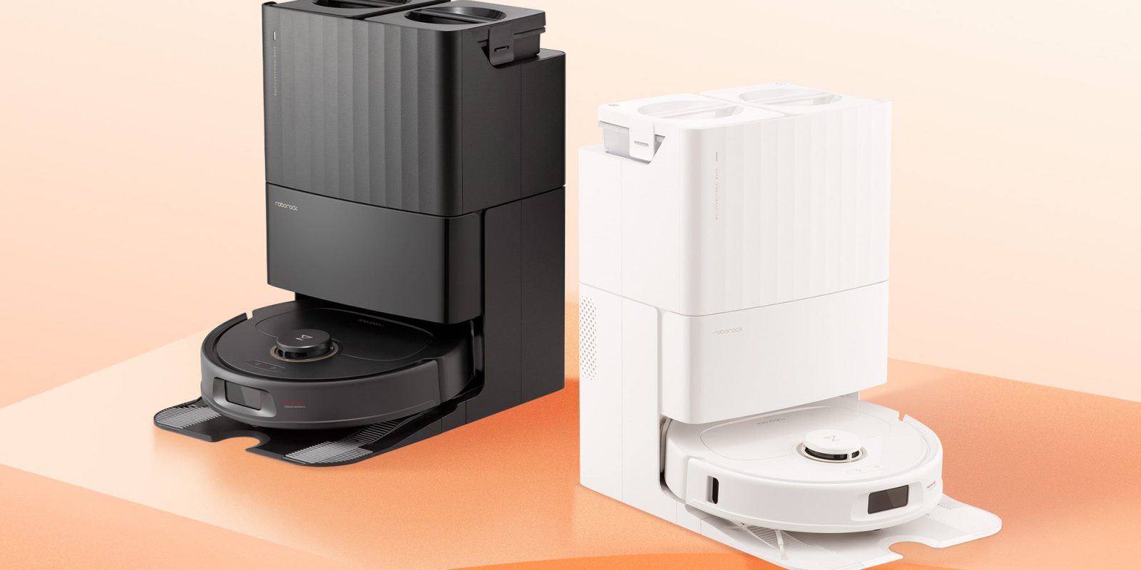 A black and white robot vacuum cleaners