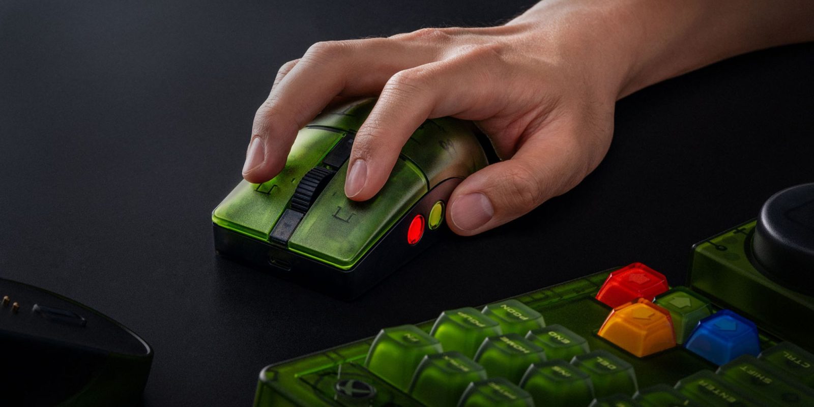 Image showing a person holding a gaming mouse.