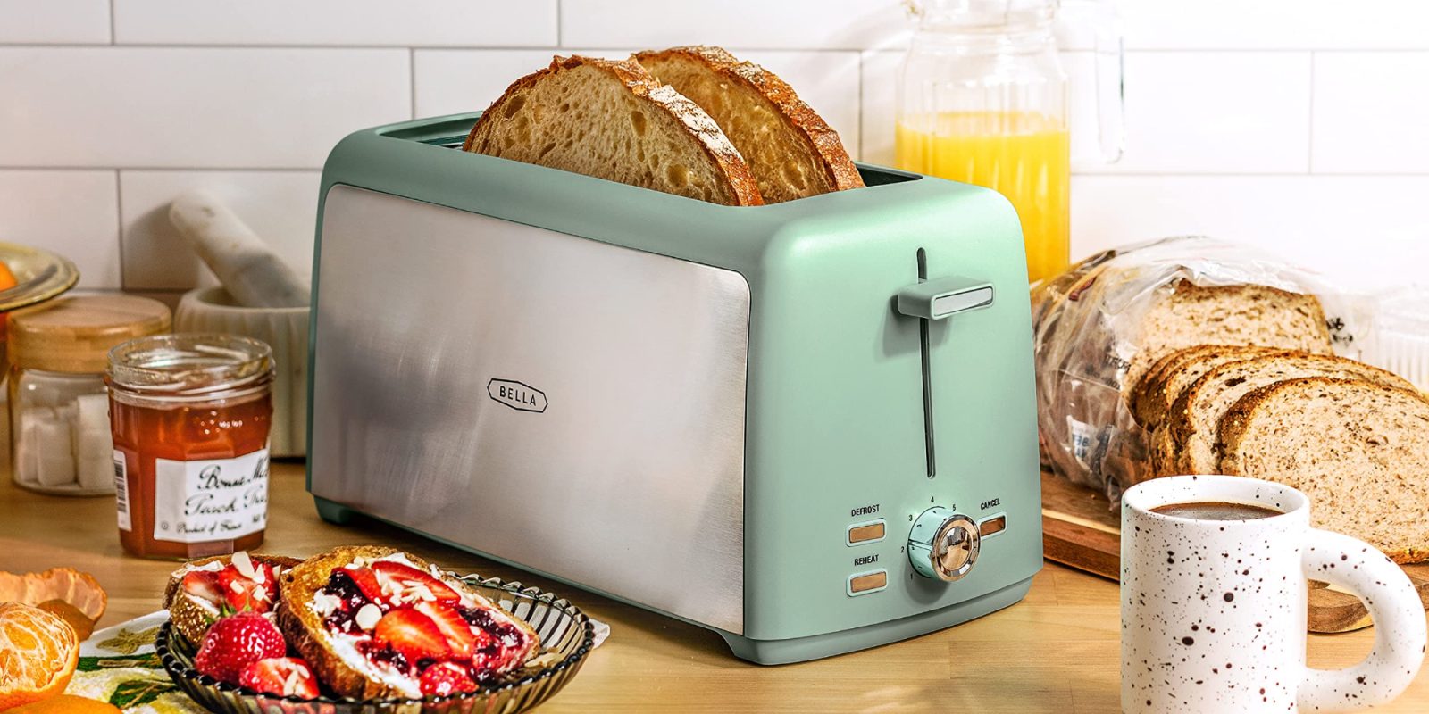 A toaster with slices of bread in it