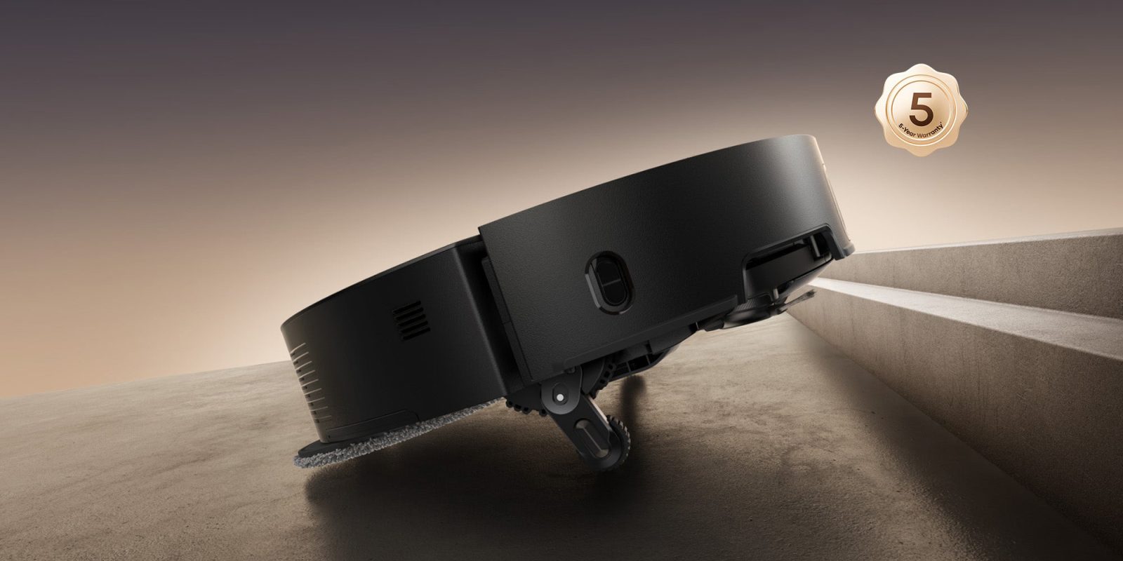 A black robot vacuum cleaner